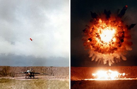 A U.S. Navy submarine-launched UGM-109 Tomahawk cruise missile hits a North American RA-5C Vigilante target aircraft