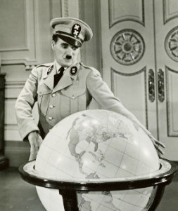 Flexians interact with each other in multiple roles as if they were Chaplin, playing multiple characters in The Great Dictator