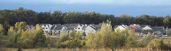 The Sunward Cohousing community illustrating greenspace preservation, tightly clustered housing, and parking on periphery, Ann Arbor, Michigan, 2003.